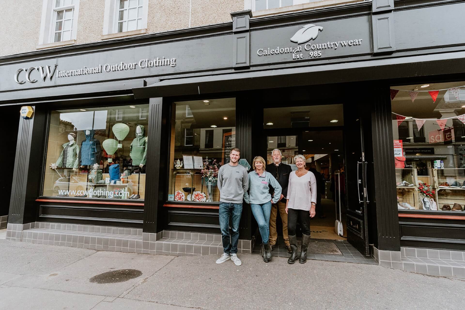 The Geddes family outside their Scottish outdoor clothing store